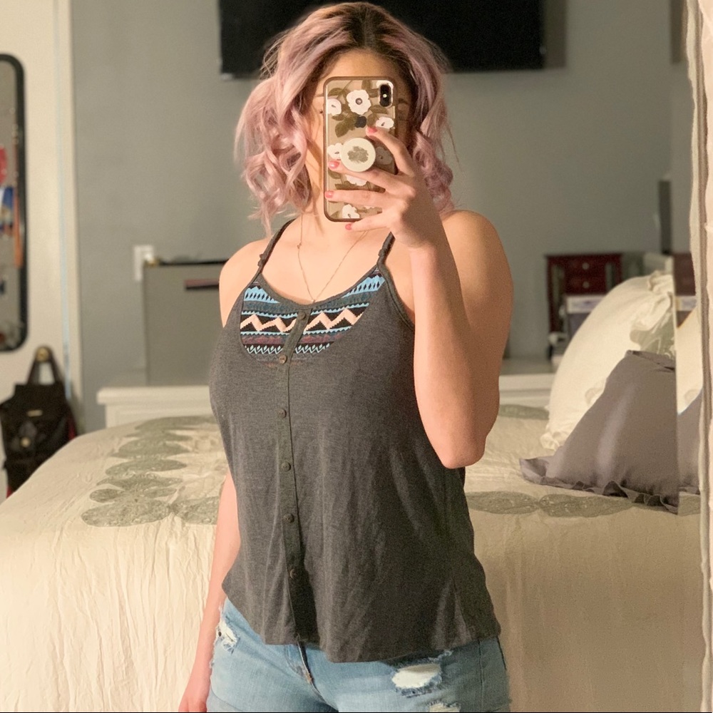 Woman’s grey tank top with tribal pattern